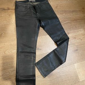 Blue jeans coated to look like leather